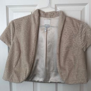 Champagne colored shrug perfect to layer